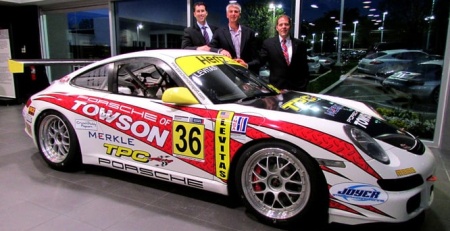 Mike Levitas of TPC Racing posing with his GT3 Cup Car at Porsche of Towson